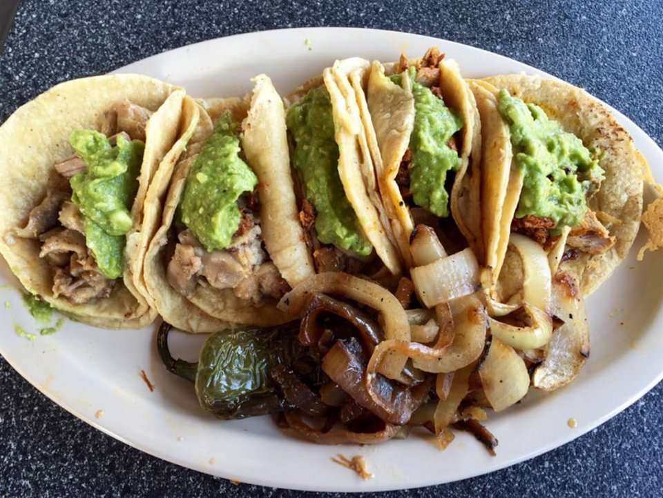 Menu page showing seafood dishes and Mexican classics.